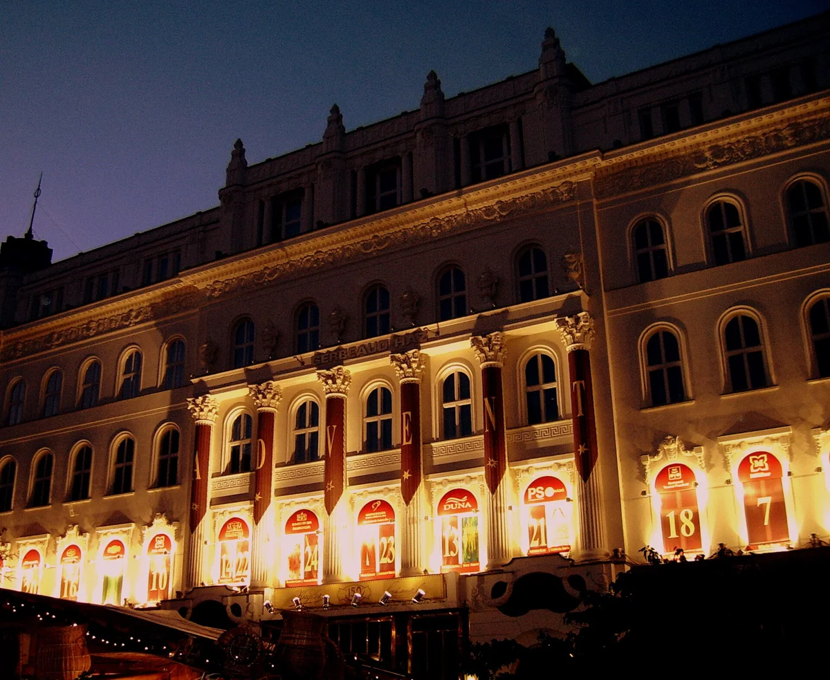 The Gerbeaud café facade on Vörösmarty Square lit as an Advent calendar, passed on a Budapest Christmas market tour